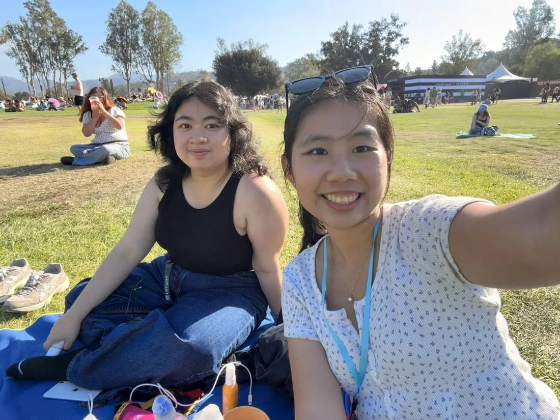 Sue with a friend at an outdoor concert